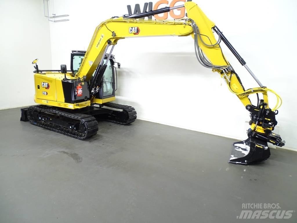 CAT 310 Rupsgraafmachines