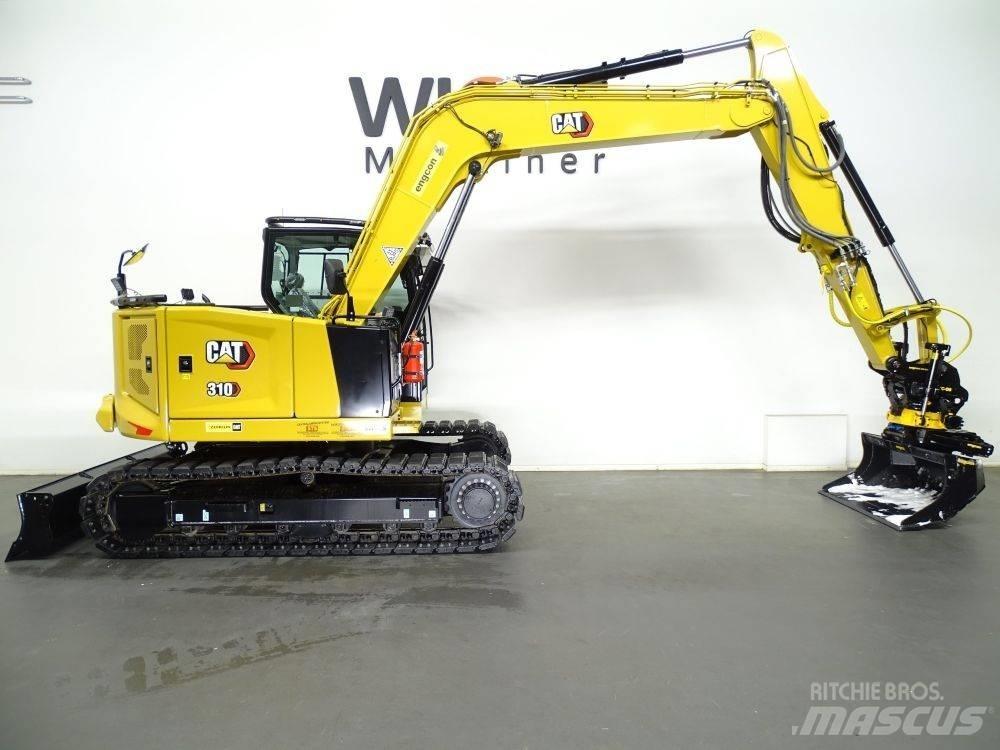 CAT 310 Rupsgraafmachines