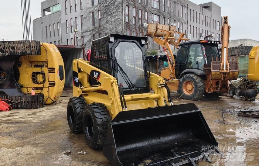 CAT 246D Schrankladers