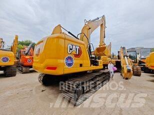 CAT 323 Rupsgraafmachines