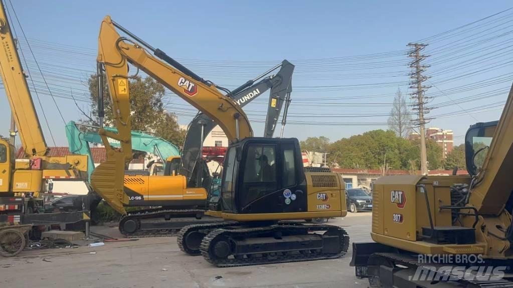 CAT 313 D Rupsgraafmachines