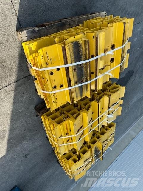 Komatsu d 85 plate Rupsbanden, kettingen en onderstel