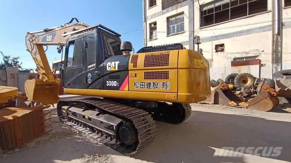 CAT 330 Rupsgraafmachines