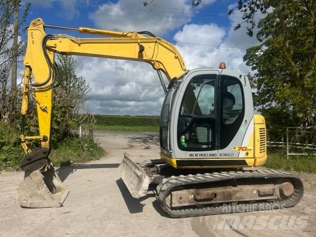 New Holland E 70 SR Midigraafmachines 7t - 12t