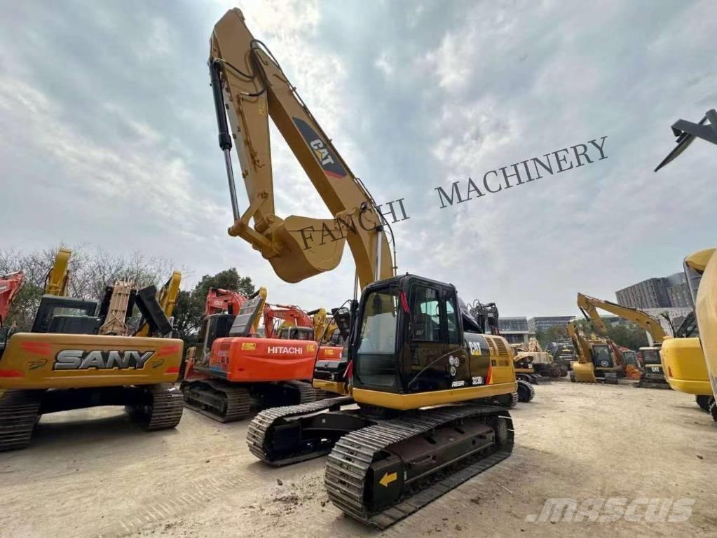 CAT 323 D2 Rupsgraafmachines