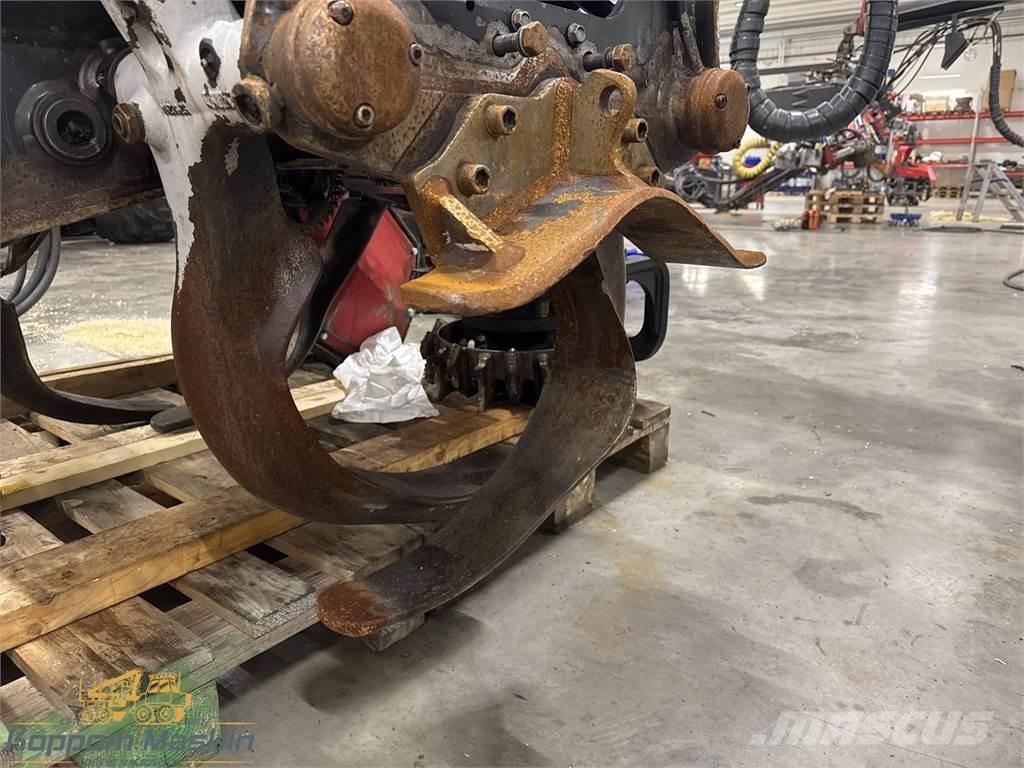 Komatsu C144 Boomvelkoppen