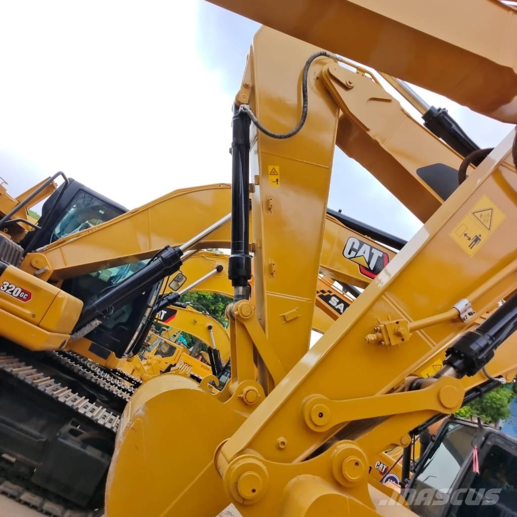 CAT 323 D Rupsgraafmachines