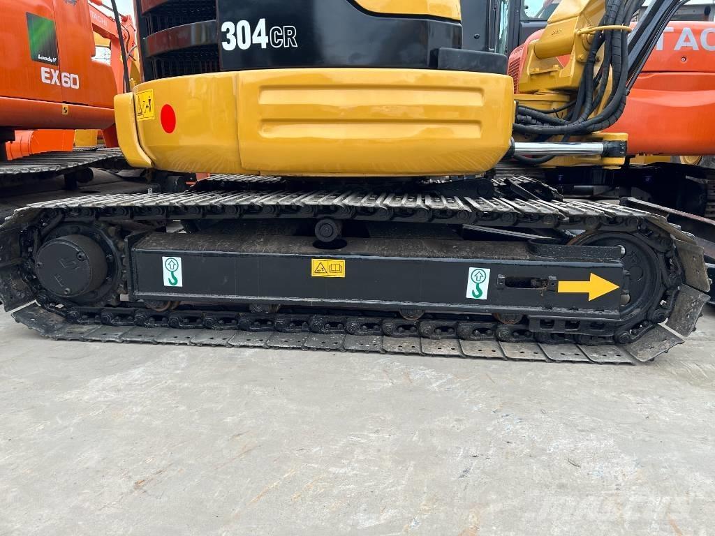 CAT 304 Rupsgraafmachines