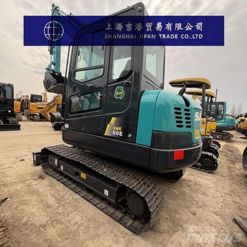 Sunward SWE 60 E Rupsgraafmachines
