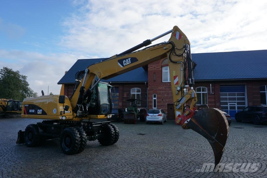 CAT M 318 D Wielgraafmachines