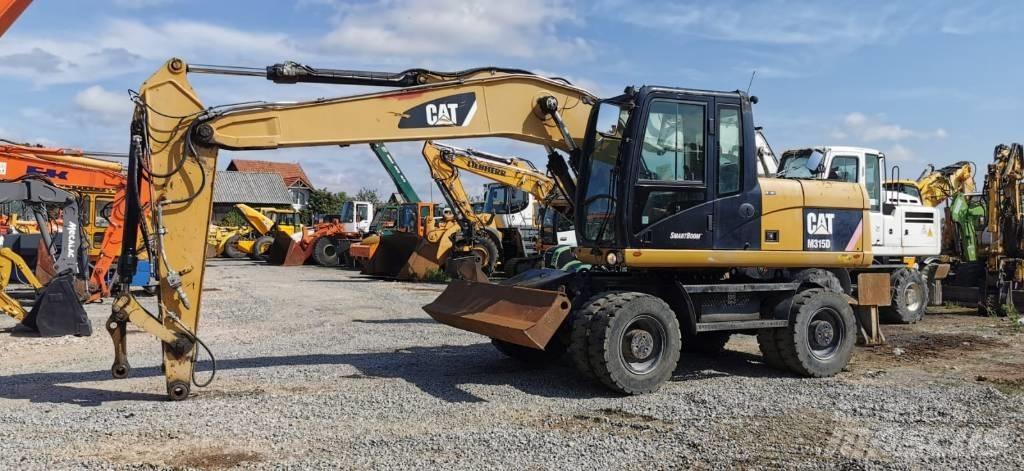 CAT M 315 D Wielgraafmachines