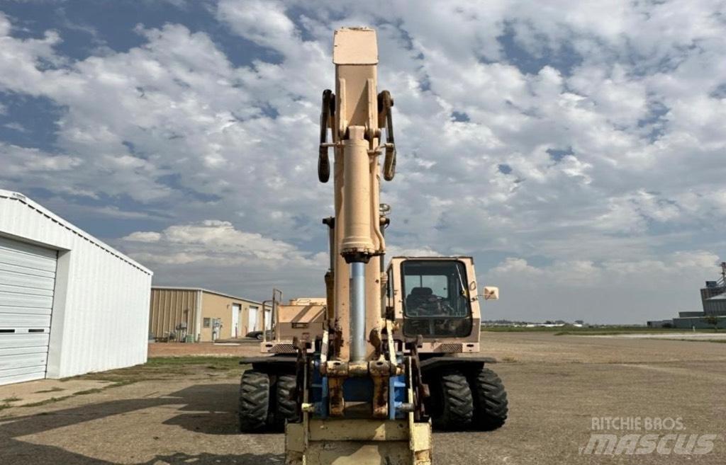 John Deere 595 Wielgraafmachines