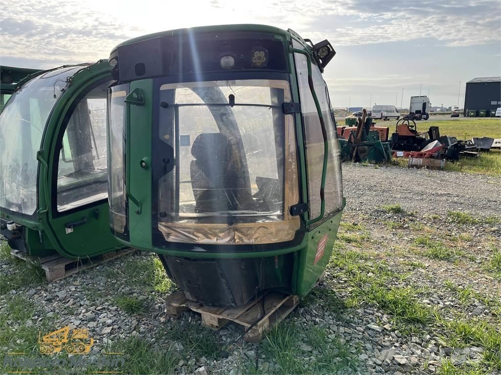 John Deere 1010E Cabine en interieur