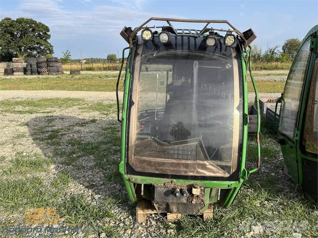 John Deere 1010E Cabine en interieur