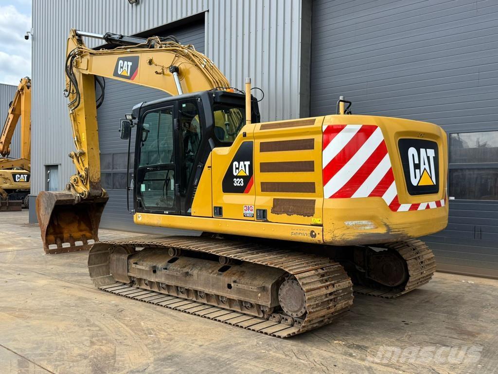 CAT 323 Rupsgraafmachines