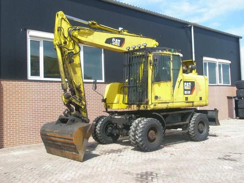 CAT M318F Wielgraafmachines