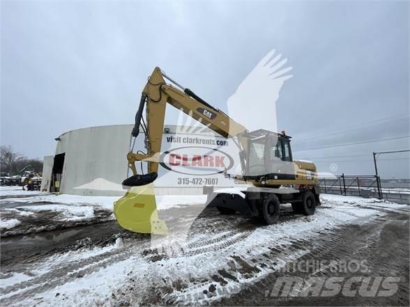 CAT M318D Wielgraafmachines