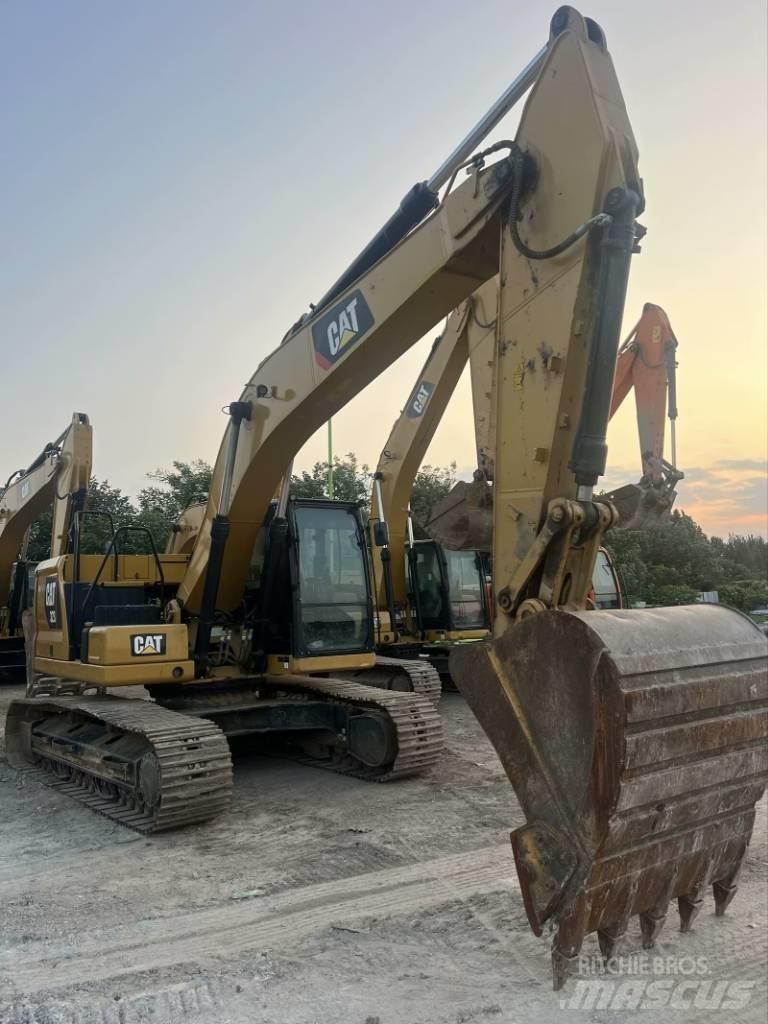 CAT 323 GC Rupsgraafmachines