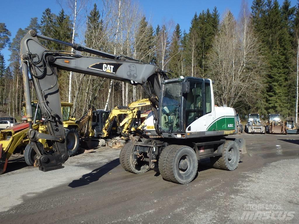 CAT M 313 C 4x4 Wielgraafmachines
