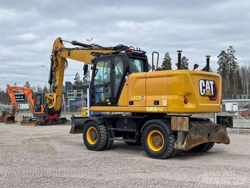 CAT M 318 Wielgraafmachines