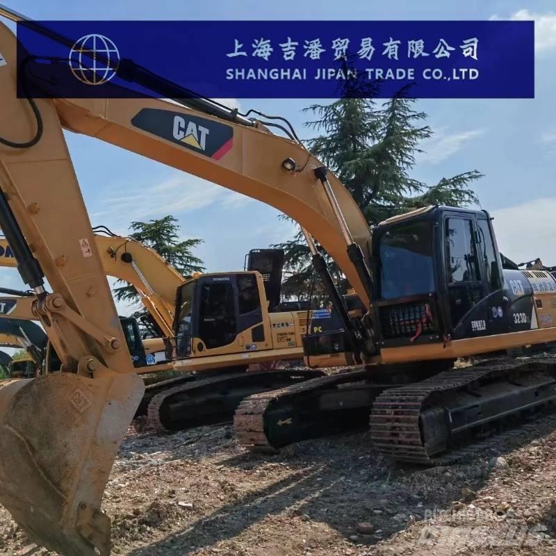 CAT 323 D Rupsgraafmachines