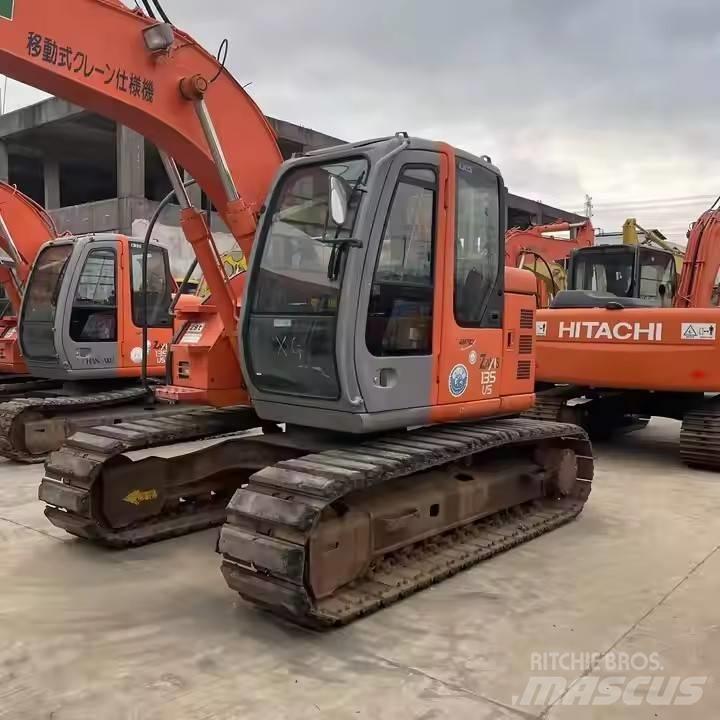 Hitachi ZX135US Rupsgraafmachines