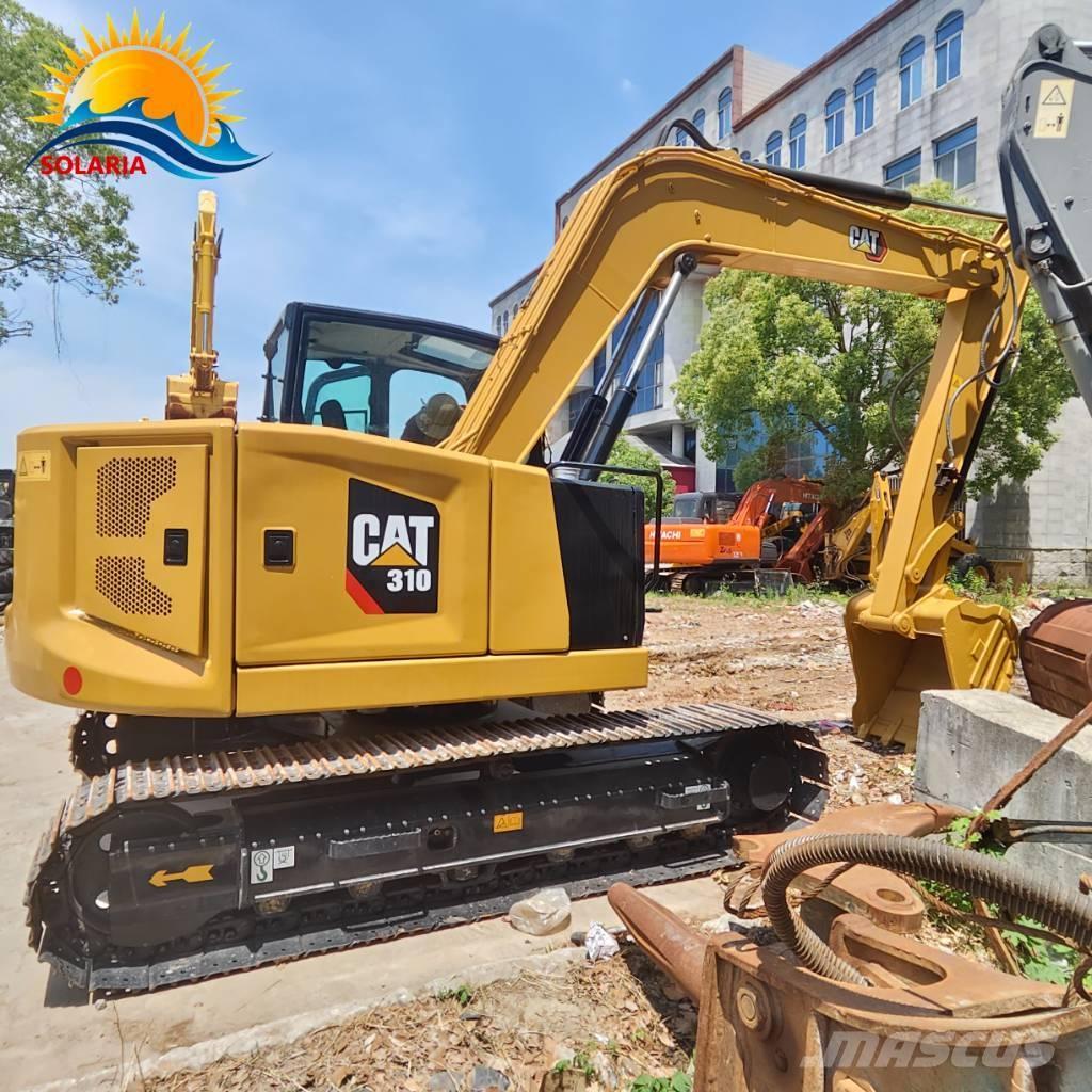 CAT 310 Rupsgraafmachines