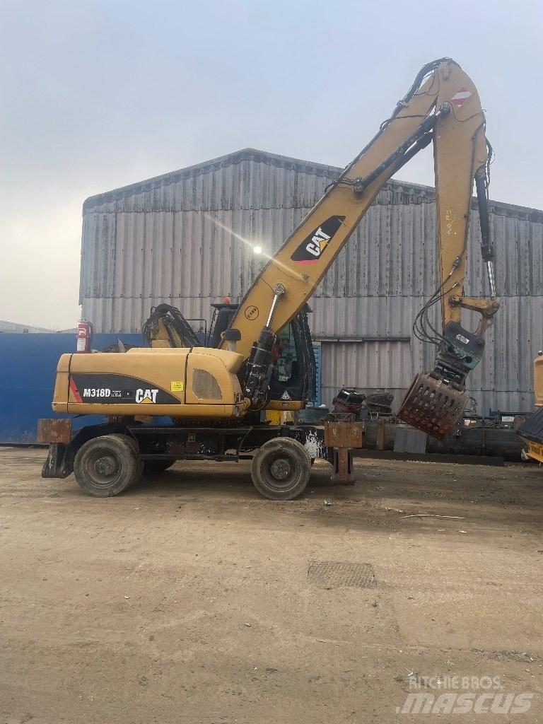 CAT 318 dmh Laden en Lossen - overige