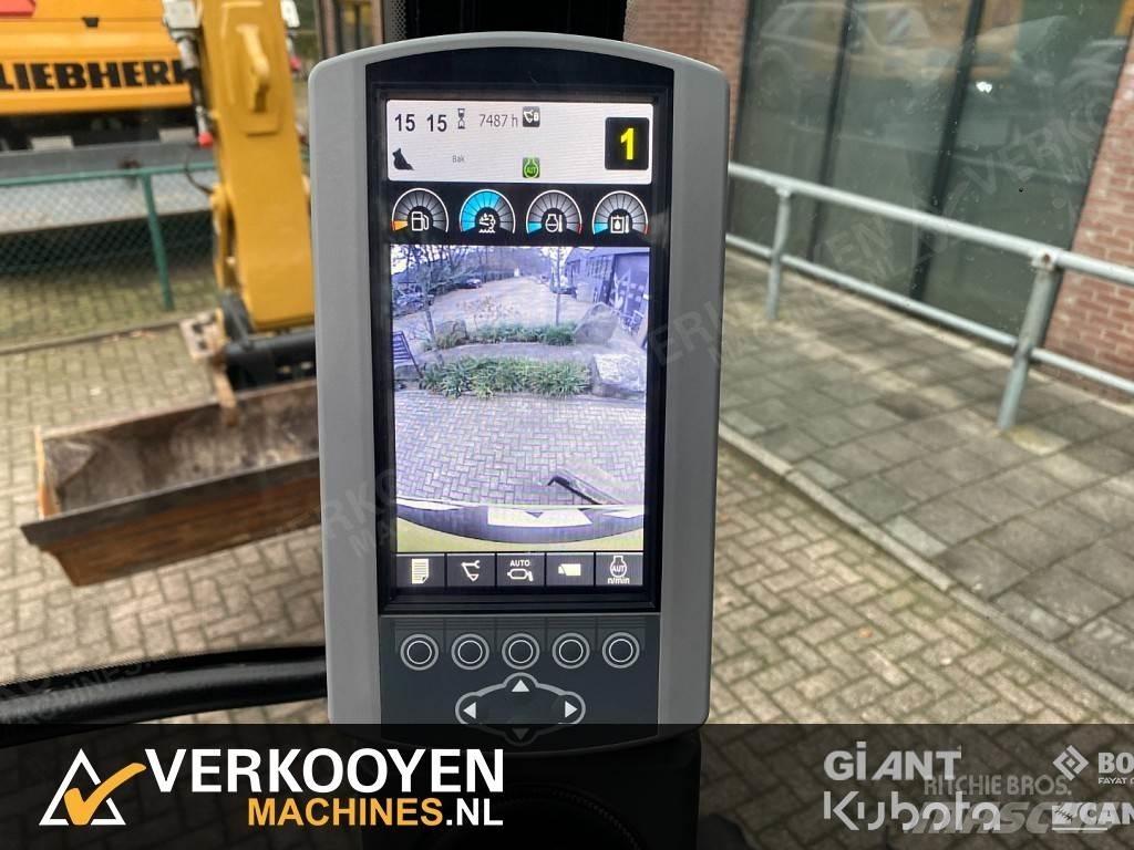 CAT M313D Wielgraafmachines