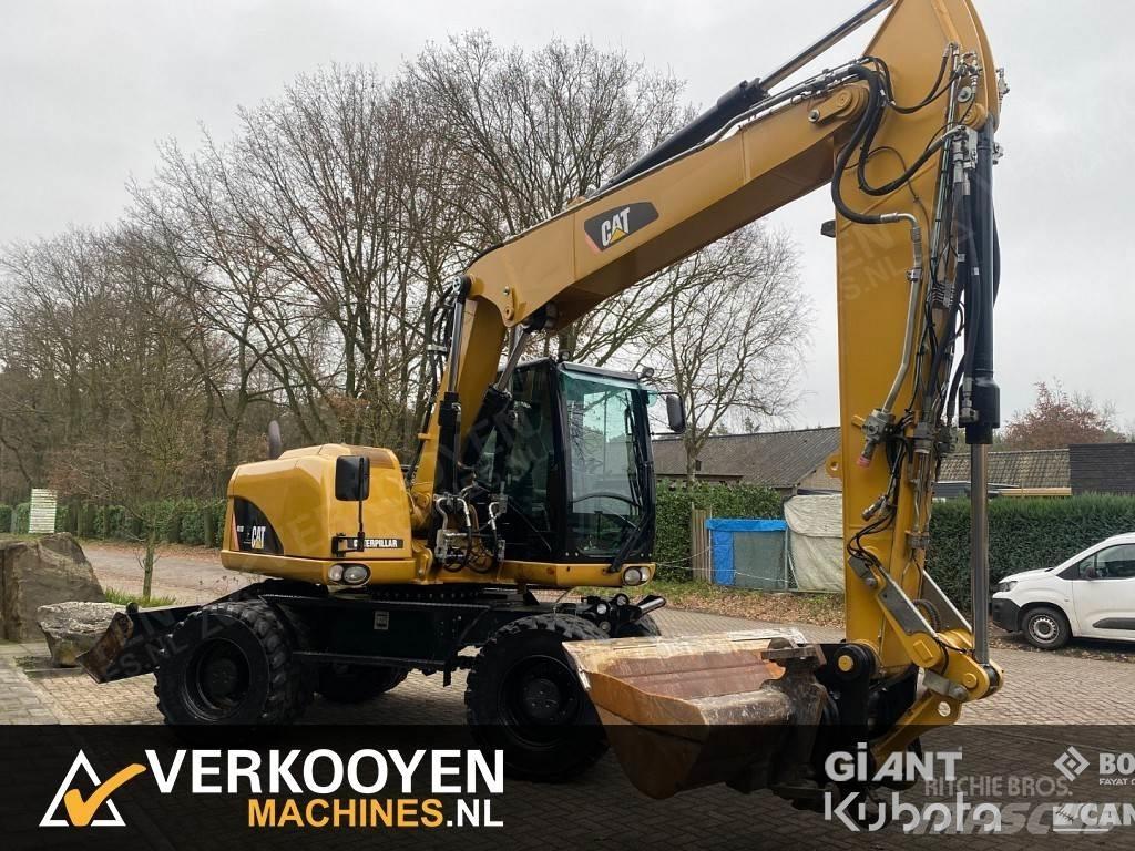 CAT M313D Wielgraafmachines