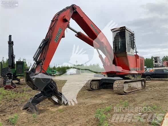Madill 3800B Boomstamladers