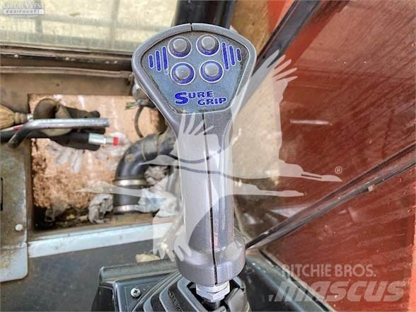 Madill 3800B Boomstamladers