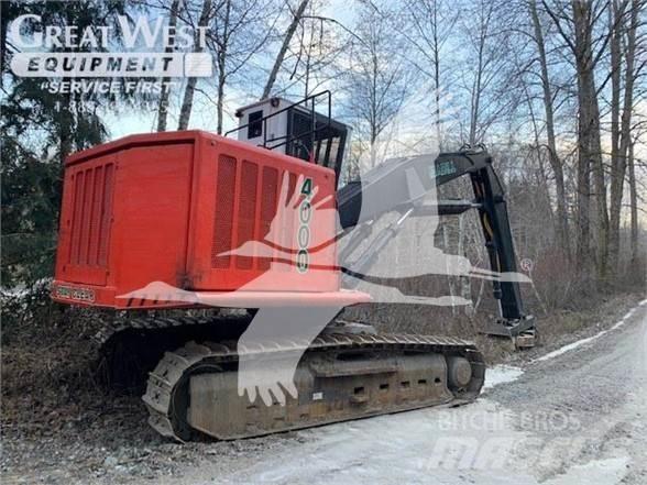 Madill 4000 Boomstamladers