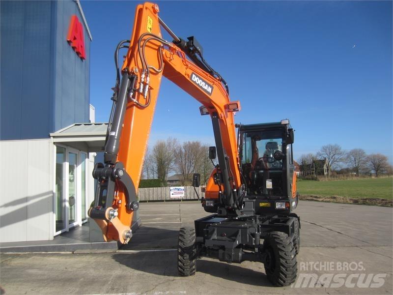 Develon DX57W-7 Minigraafmachines < 7t