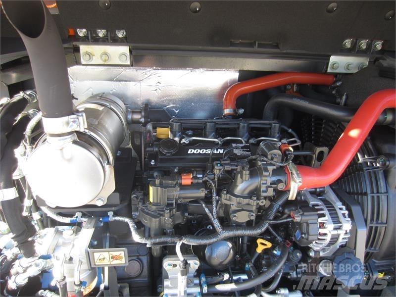 Develon DX57W-7 Minigraafmachines < 7t