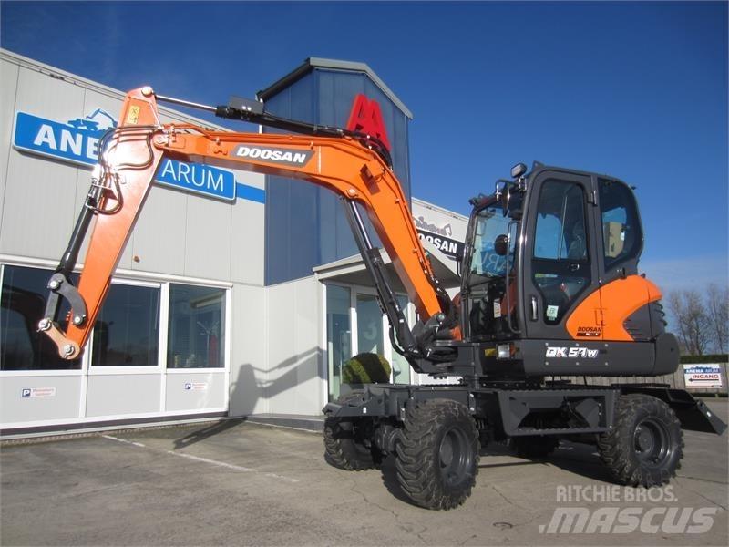 Develon DX57W-7 Minigraafmachines < 7t
