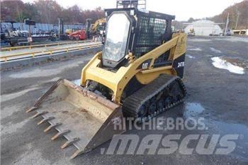 CAT 247B Schrankladers