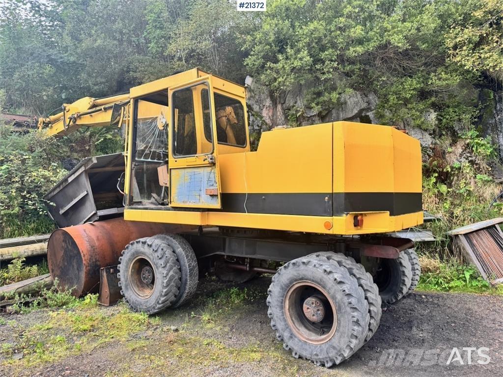 CAT 212B Wielgraafmachines