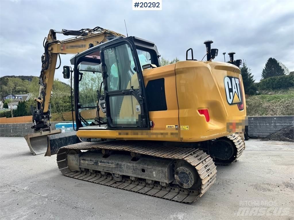 CAT 313 Rupsgraafmachines