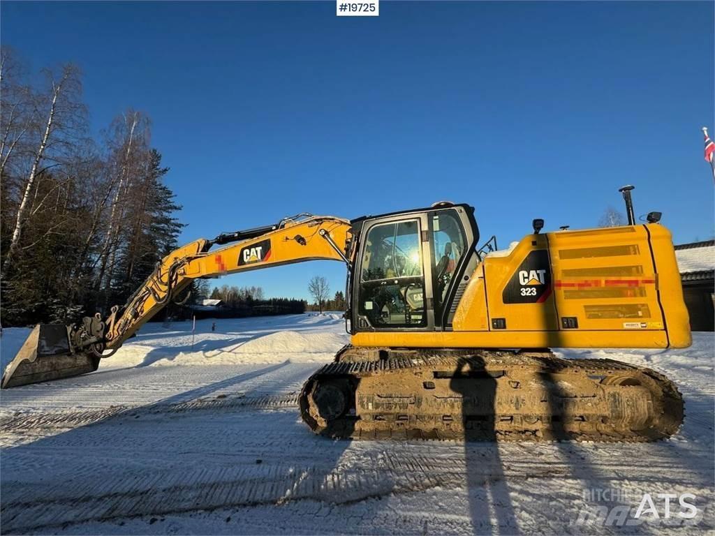 CAT 323 Rupsgraafmachines