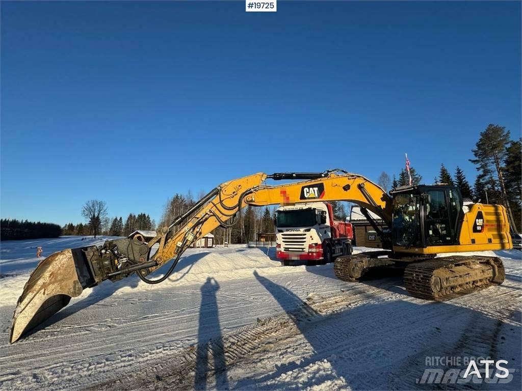CAT 323 Rupsgraafmachines