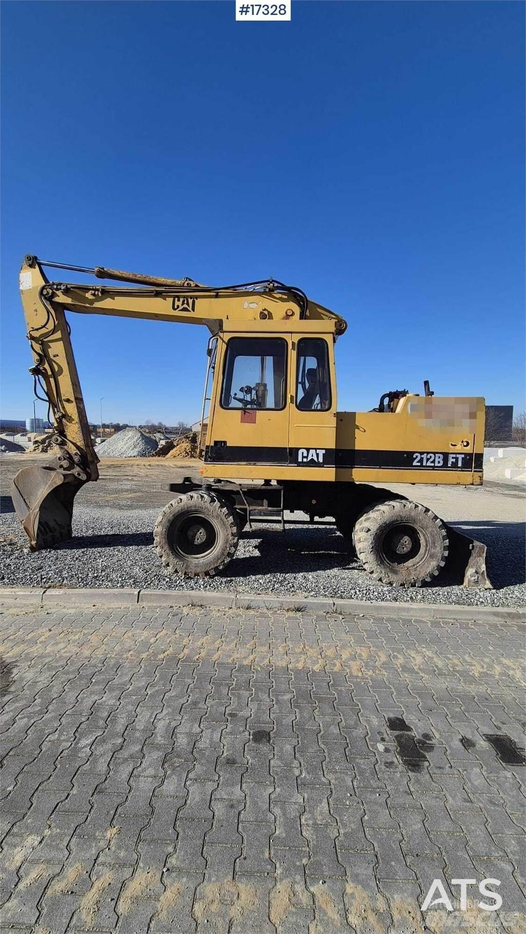 CAT 212BFT Wielgraafmachines