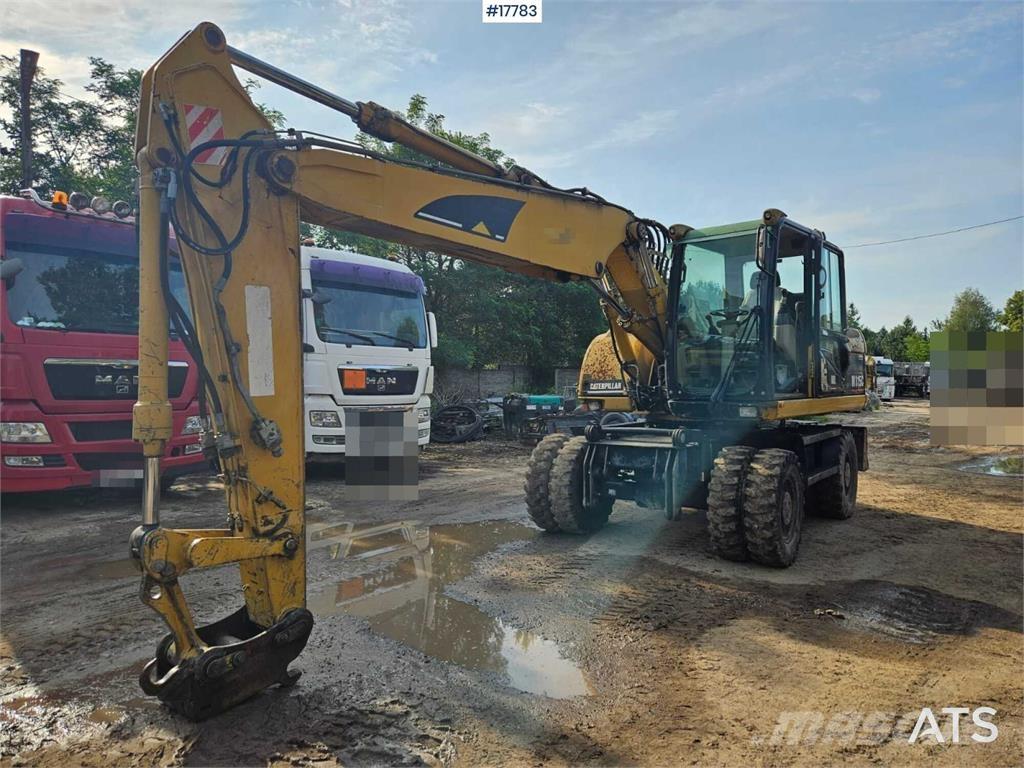 CAT M315C Wielgraafmachines