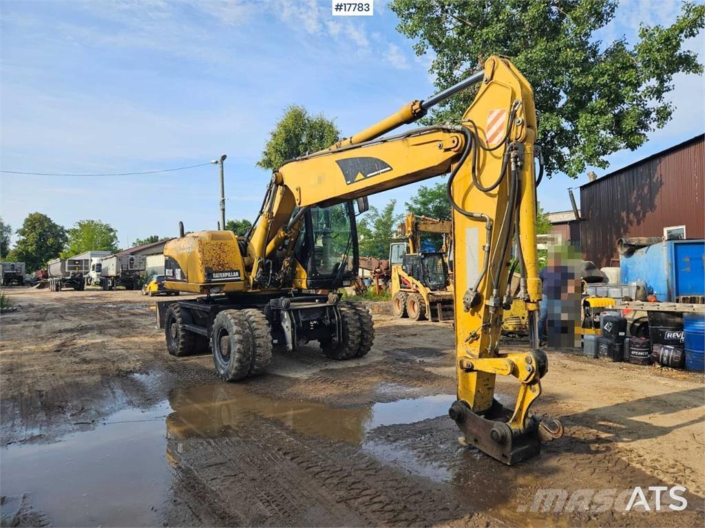 CAT M315C Wielgraafmachines