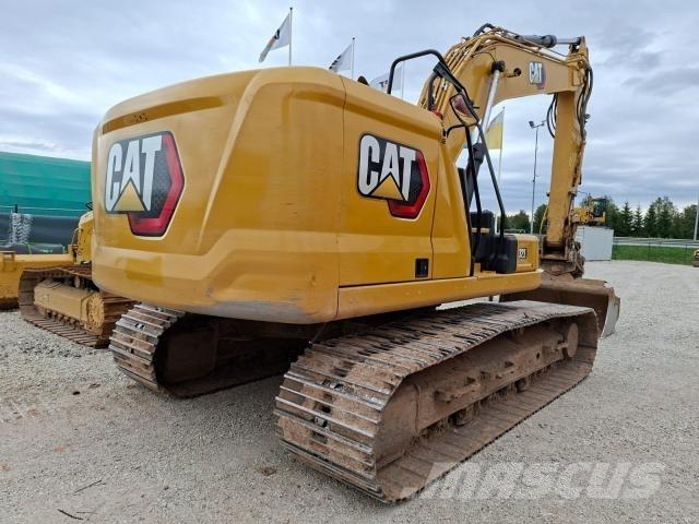 CAT 323 Rupsgraafmachines
