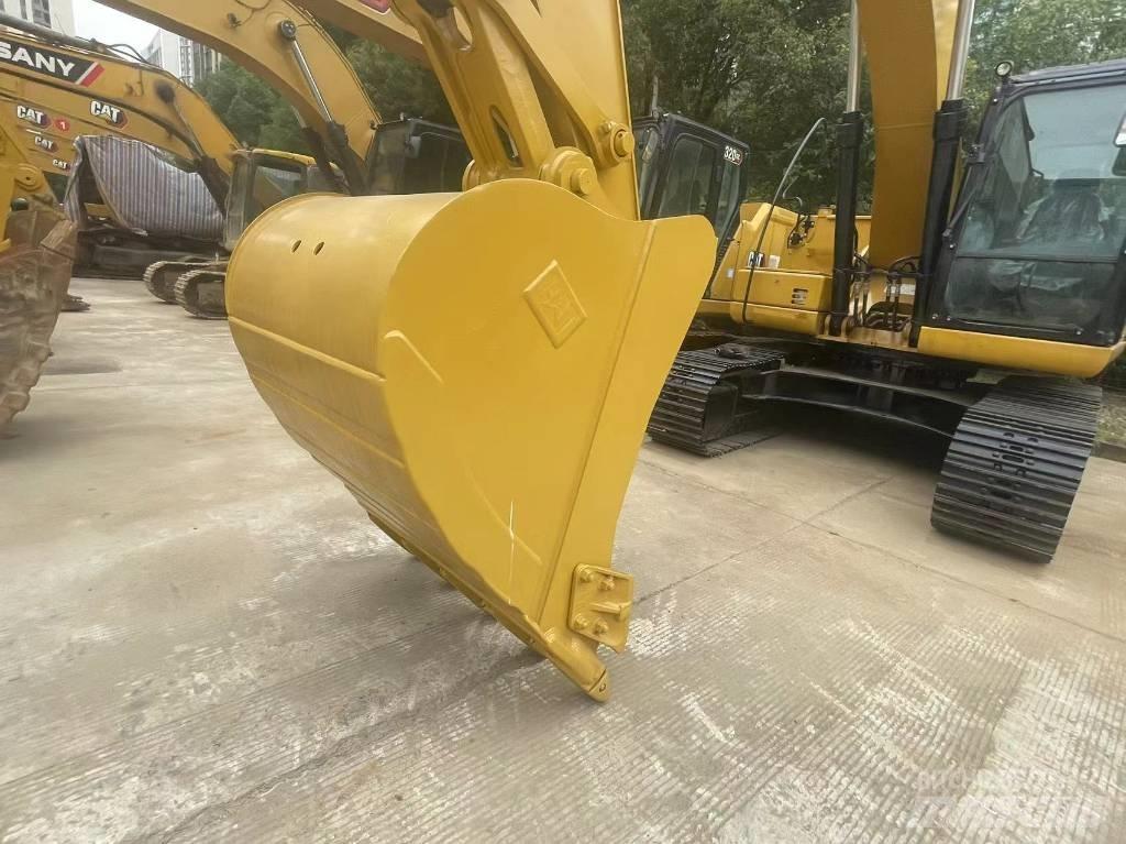 CAT 2021 CAT 323Gx Wielgraafmachines