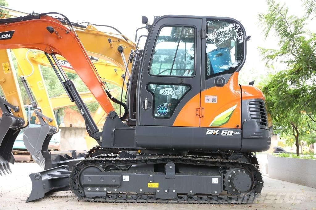 Develon DX 60 E-10 N Wielgraafmachines