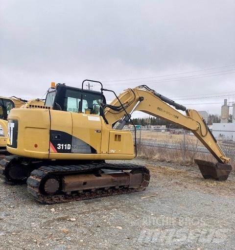 CAT 311 D Rupsgraafmachines