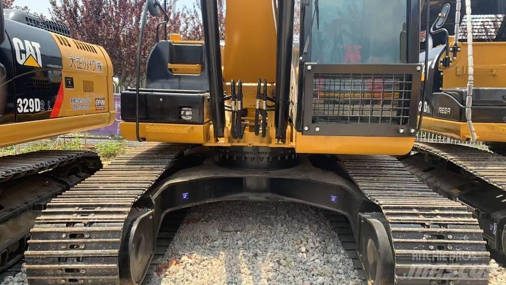 CAT 323D Rupsgraafmachines