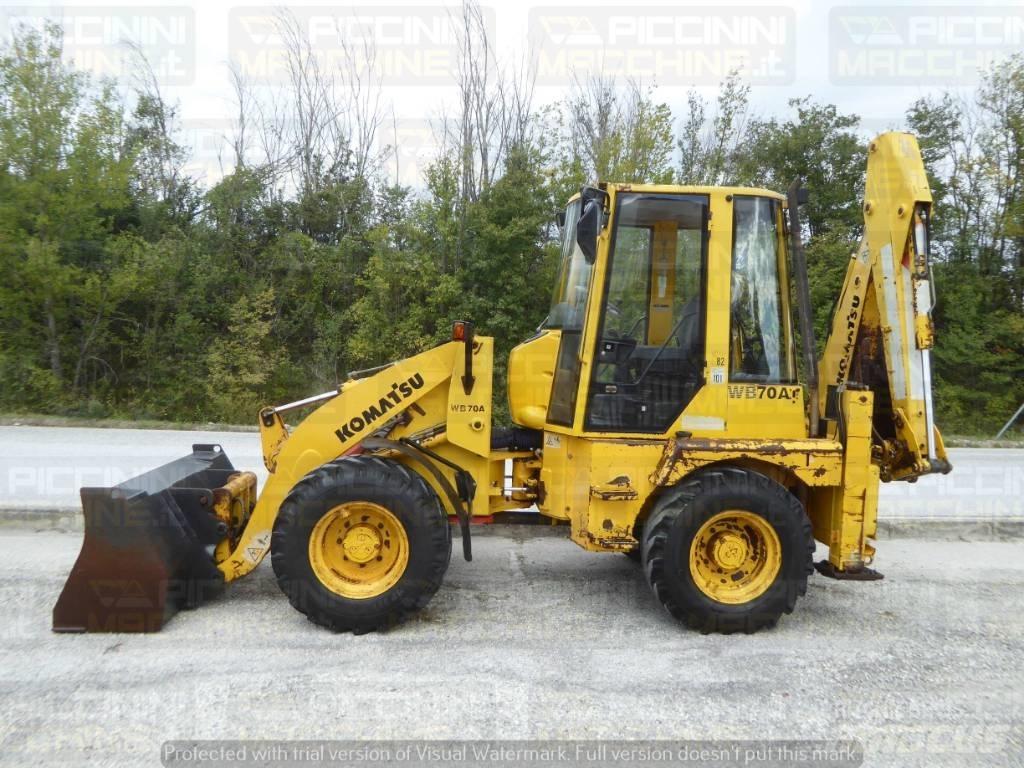 Komatsu WB70A Graaf-laadcombinaties